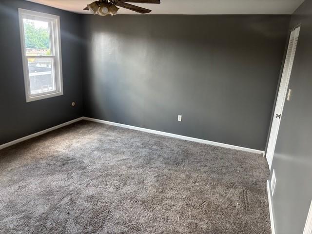 1222 Broadway Avenue, Unit 2 East McKeesport, PA 15035 - Photo 2 of 10 an empty room with windows