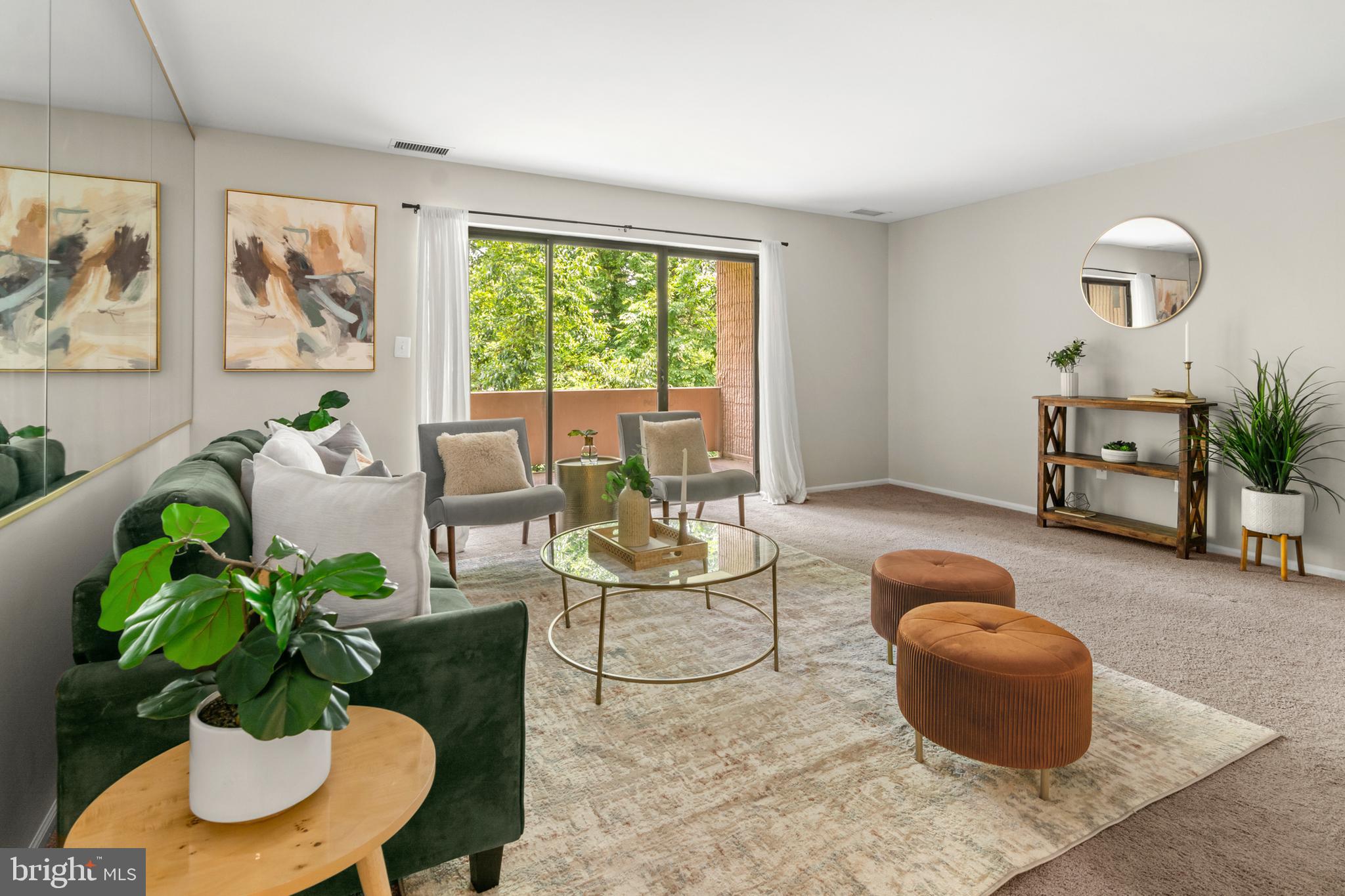 2901 Fallstaff Road, Unit 305 Baltimore, MD 21209 - Photo 4 of 13 a living room with furniture and a potted plant