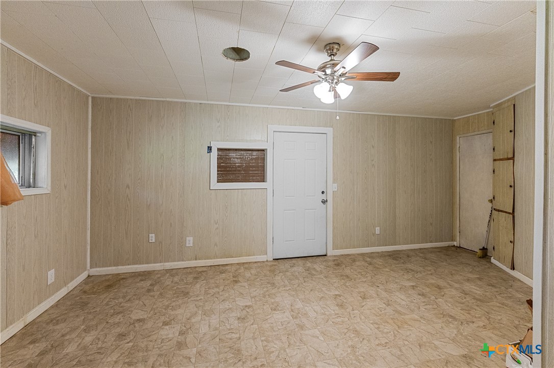 401 Kerr Street Edna, TX 77957 - Photo 10 of 23 a view of an empty room with a window