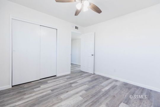 901 West Rader Avenue Ridgecrest, CA 93555 - Photo 20 of 26 a view of empty room with wooden floor