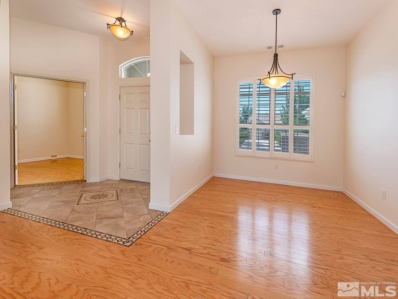 10440 Silver Rush Court Reno, NV 89521 - Photo 3 of 22 a view of an empty room and window