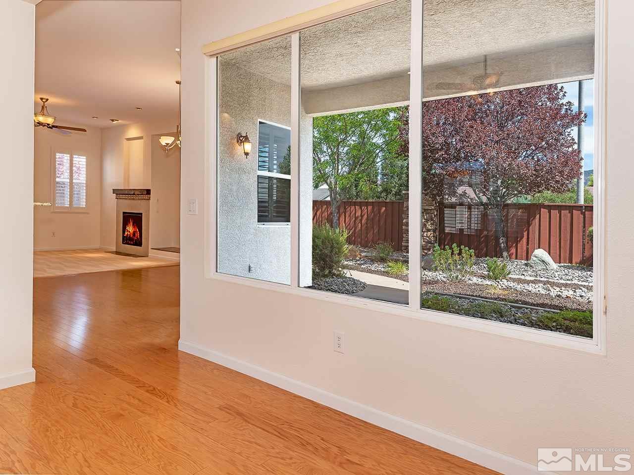 10440 Silver Rush Court Reno, NV 89521 - Photo 6 of 22 a view of a large window with an outdoor space
