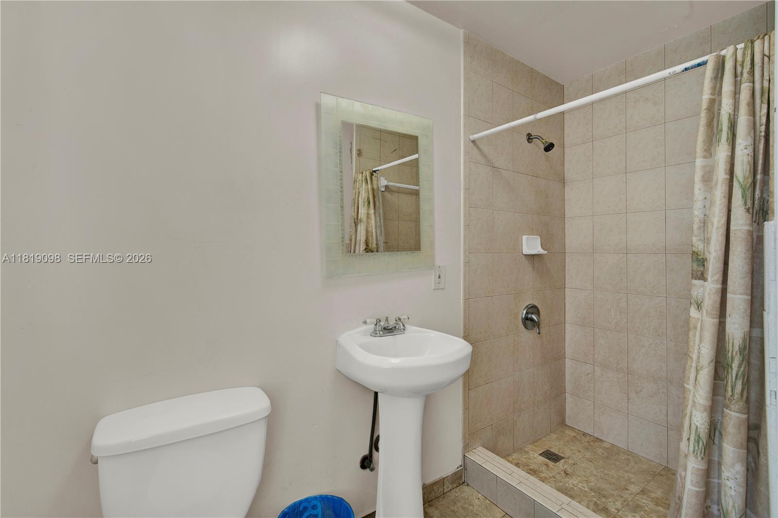 829 Southwest 19th Avenue Miami, FL 33135 - Photo 38 of 54 a bathroom with a sink a toilet and shower