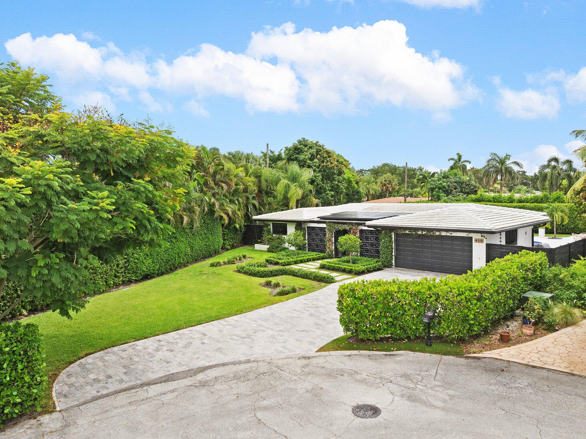 410 Southwest 7th Way Boca Raton, FL 33486 - Photo 2 of 6 aerial view of a house with a yard