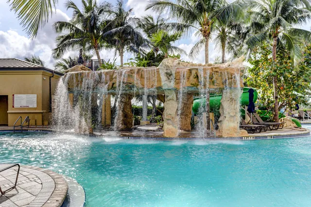 a view of a kitchen counter space and windows