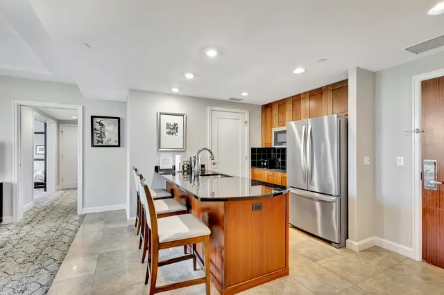 a view of a balcony with chairs