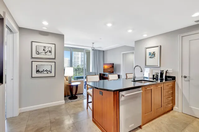 a bedroom with furniture and a flat screen tv