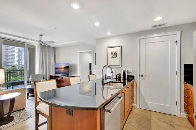 a view of a floor to ceiling window and a deck