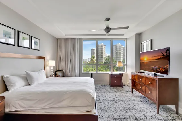 a living room with lots of furniture and appliances