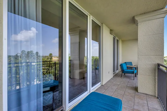 a bedroom with furniture and a book shelf