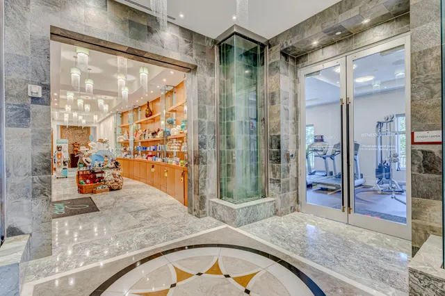 a view of a palm trees front of house