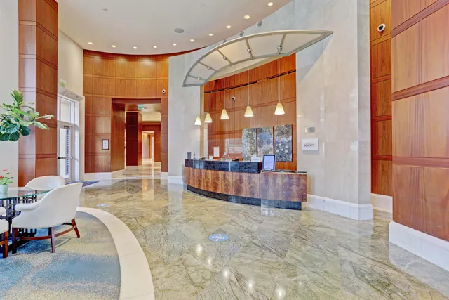 a view of a park with palm trees