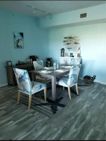 a view of a dining room with furniture