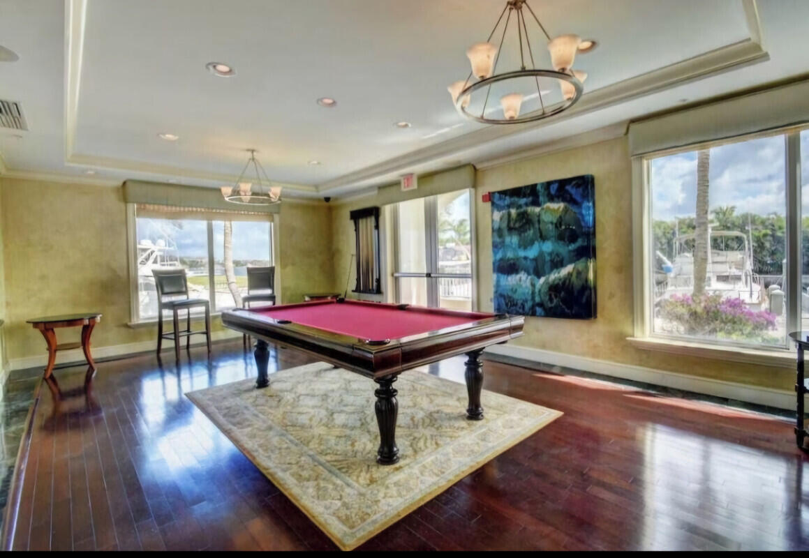 802 West Windward Way, Unit 309 Lantana, FL 33462 - Photo 9 of 10 a room with furniture pool table and windows