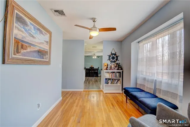 a view of livingroom with furniture and wooden floor