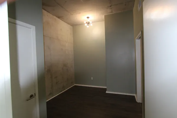 a empty room with wooden floor