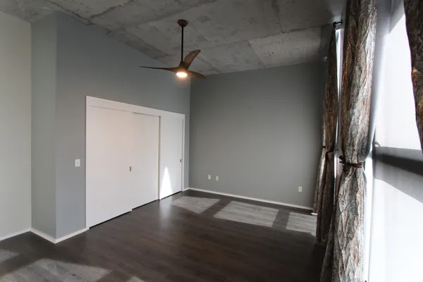 an entryway with a window and a glass door