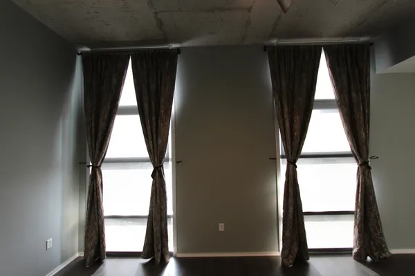 a view of a livingroom and a hallway