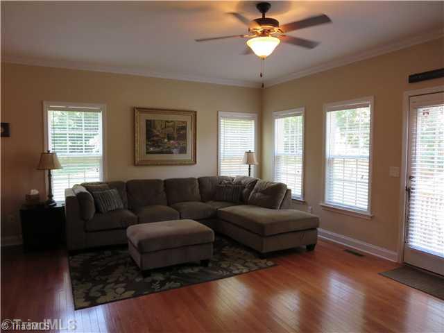 5540 Folkstone Road Pfafftown, NC 27040 - Photo 8 of 16 Den/Family/Great Room. Lots of Natural Light and Ceiling Fan, Access to Deck