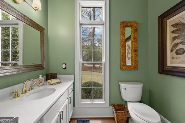 an open kitchen with stainless steel appliances granite countertop a stove and a refrigerator