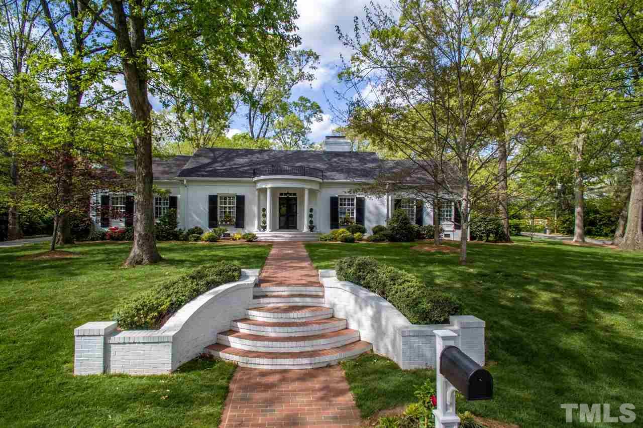 700 Yarmouth Road Raleigh, NC 27607 - Photo 1 of 25 a front view of a house with a yard