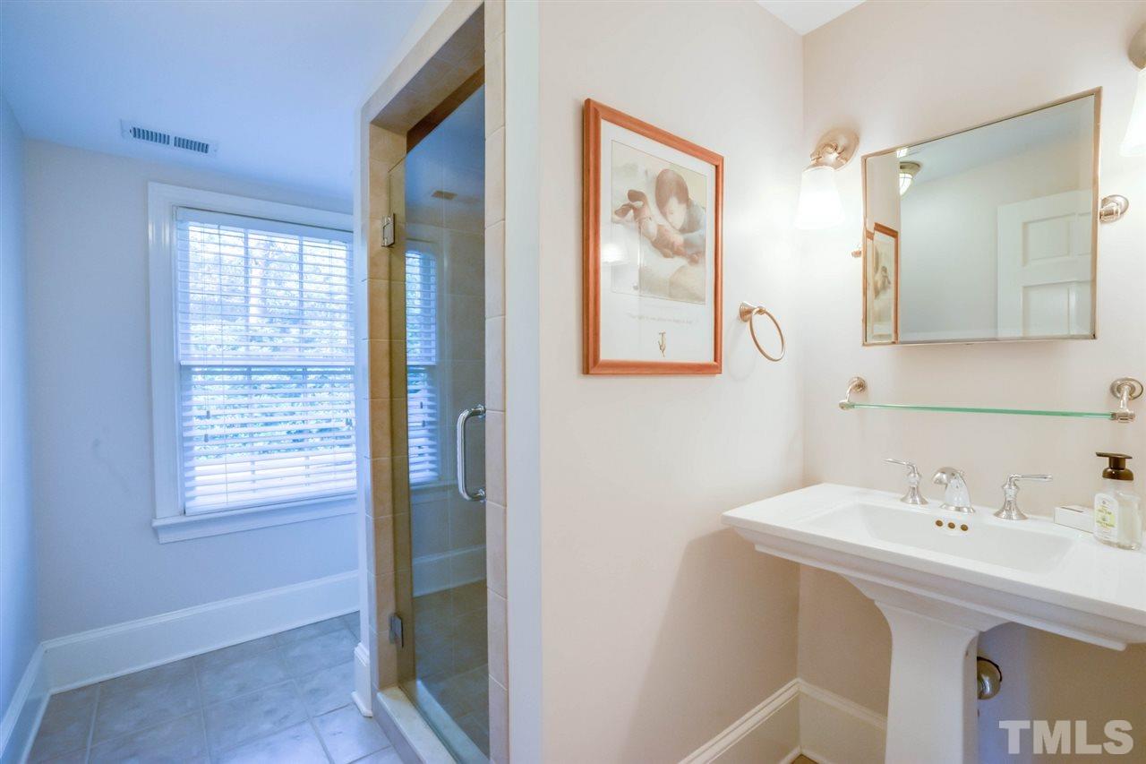700 Yarmouth Road Raleigh, NC 27607 - Photo 25 of 25 a bathroom with a sink and a mirror