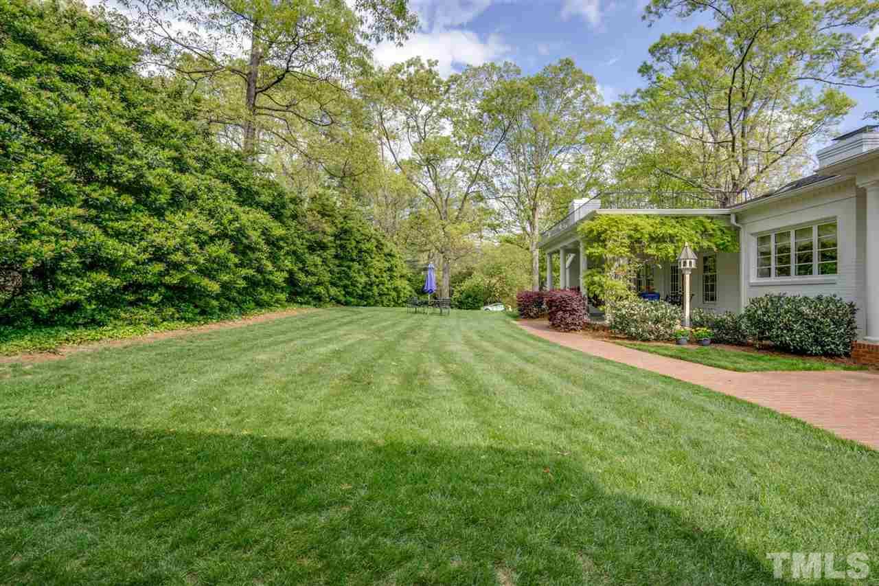 700 Yarmouth Road Raleigh, NC 27607 - Photo 5 of 25 a view of a backyard with garden