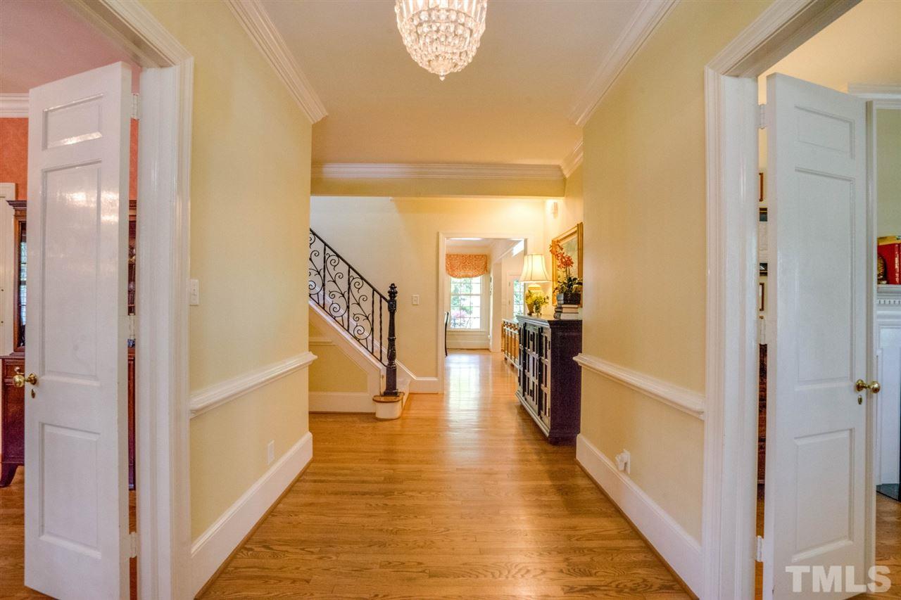 700 Yarmouth Road Raleigh, NC 27607 - Photo 7 of 25 a view of a hallway with wooden floor