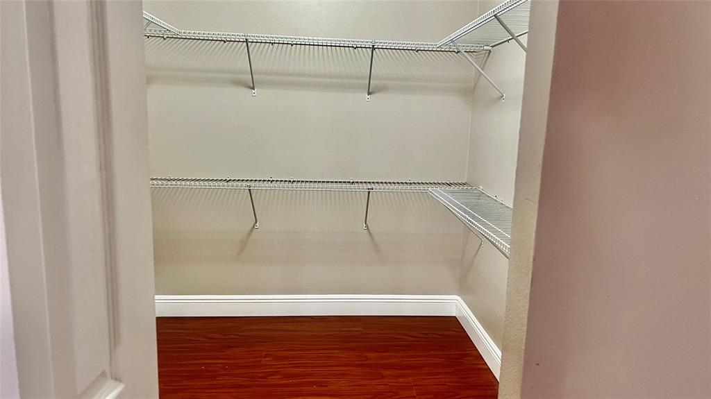 1874 Southwest 81st Lane, Unit 1874 Davie, FL 33324 - Photo 11 of 21 a view of an empty walk in closet