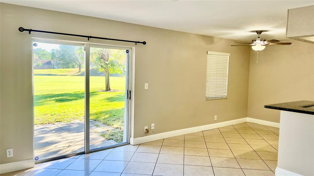 1874 Southwest 81st Lane, Unit 1874 Davie, FL 33324 - Photo 8 of 21 a view of an empty room with a window