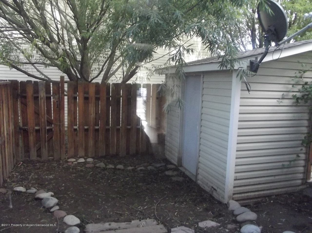 2502 Rail Avenue Rifle, CO 81650 - Photo 4 of 5 a view of a pathway of a house