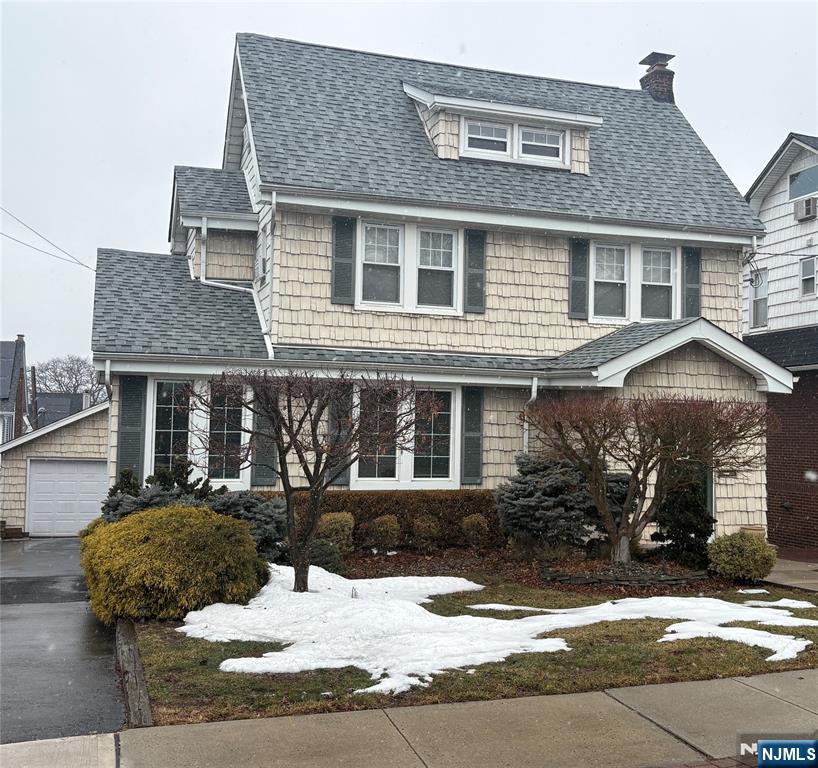 5 Hamilton Avenue Kearny, NJ 07032 - Photo 1 of 3 a front view of a house with a yard