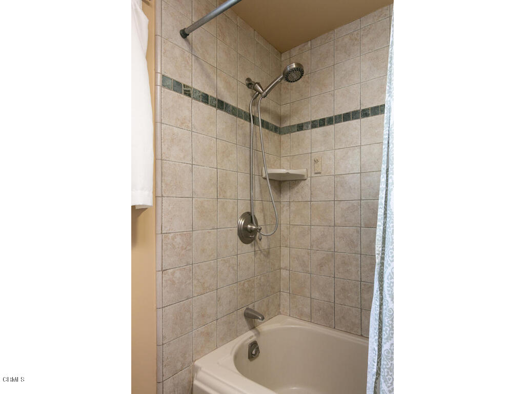 564 Burnham Road Oak View, CA 93022 - Photo 16 of 37 a bathroom with a bathtub and shower