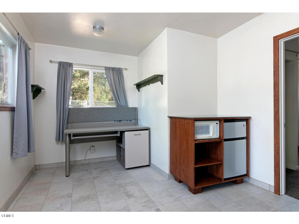 564 Burnham Road Oak View, CA 93022 - Photo 20 of 37 a room with furniture and a window