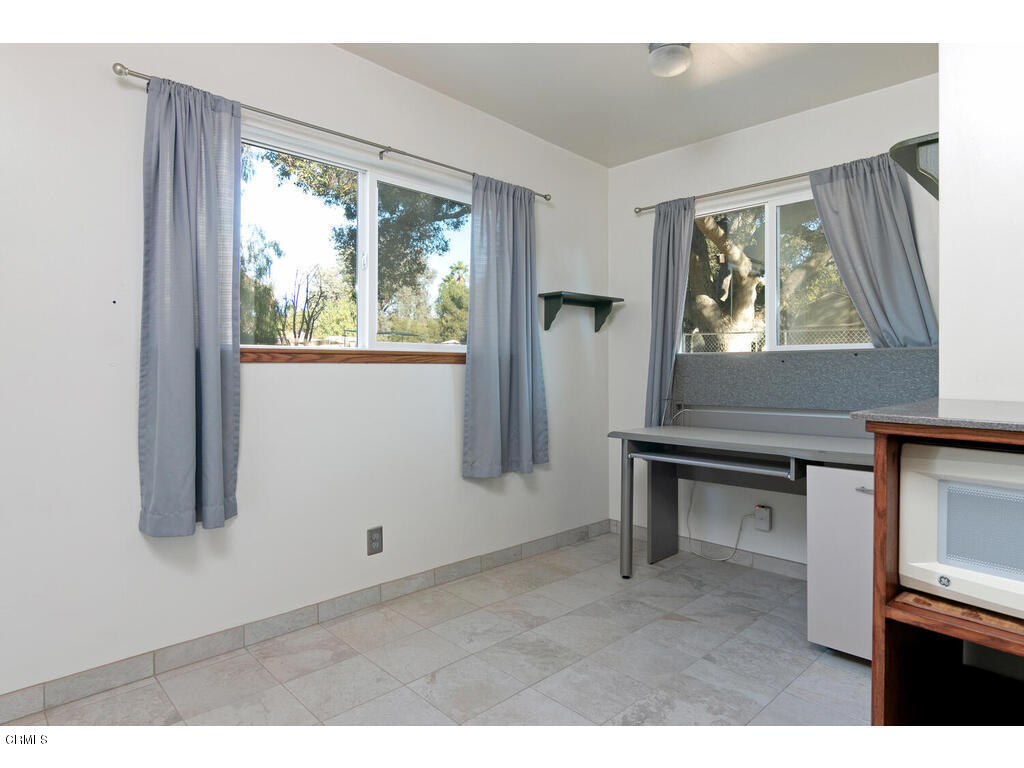 564 Burnham Road Oak View, CA 93022 - Photo 21 of 37 a workspace with furniture and window