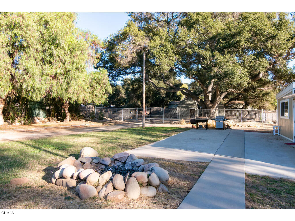 564 Burnham Road Oak View, CA 93022 - Photo 25 of 37 a view of swimming pool and trees in the background