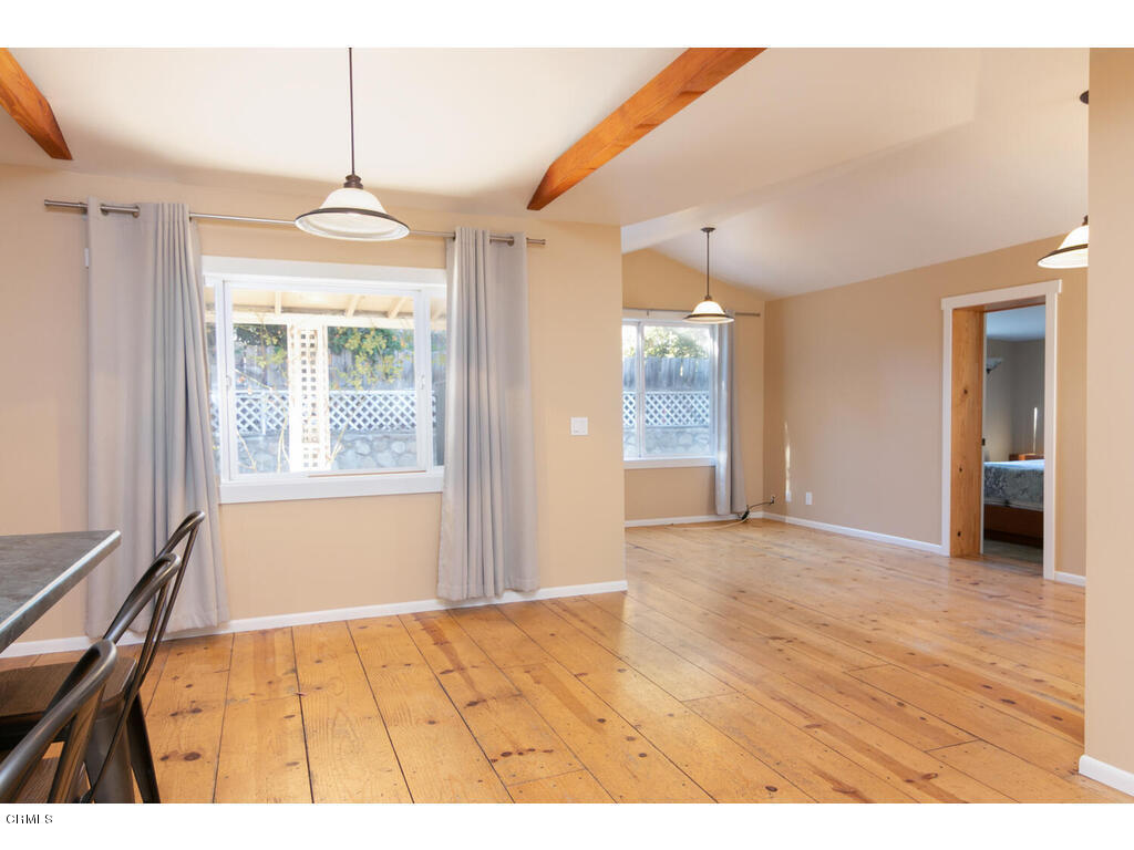 564 Burnham Road Oak View, CA 93022 - Photo 9 of 37 a view of an empty room with wooden floor and a window