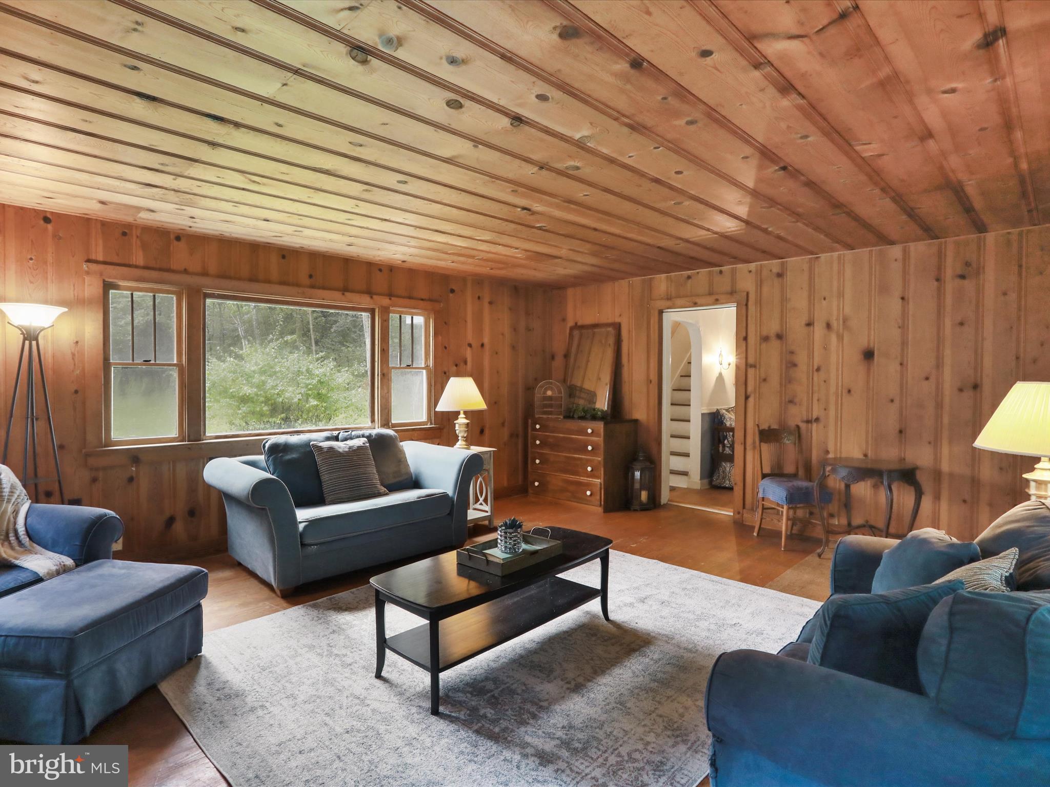 1485 Compton Hollow Road Rileyville, VA 22650 - Photo 11 of 55 a living room with furniture and a large window