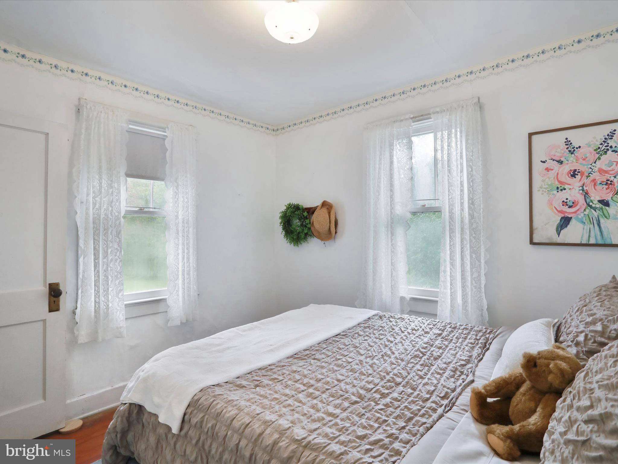 1485 Compton Hollow Road Rileyville, VA 22650 - Photo 22 of 55 a bedroom with a bed and a window