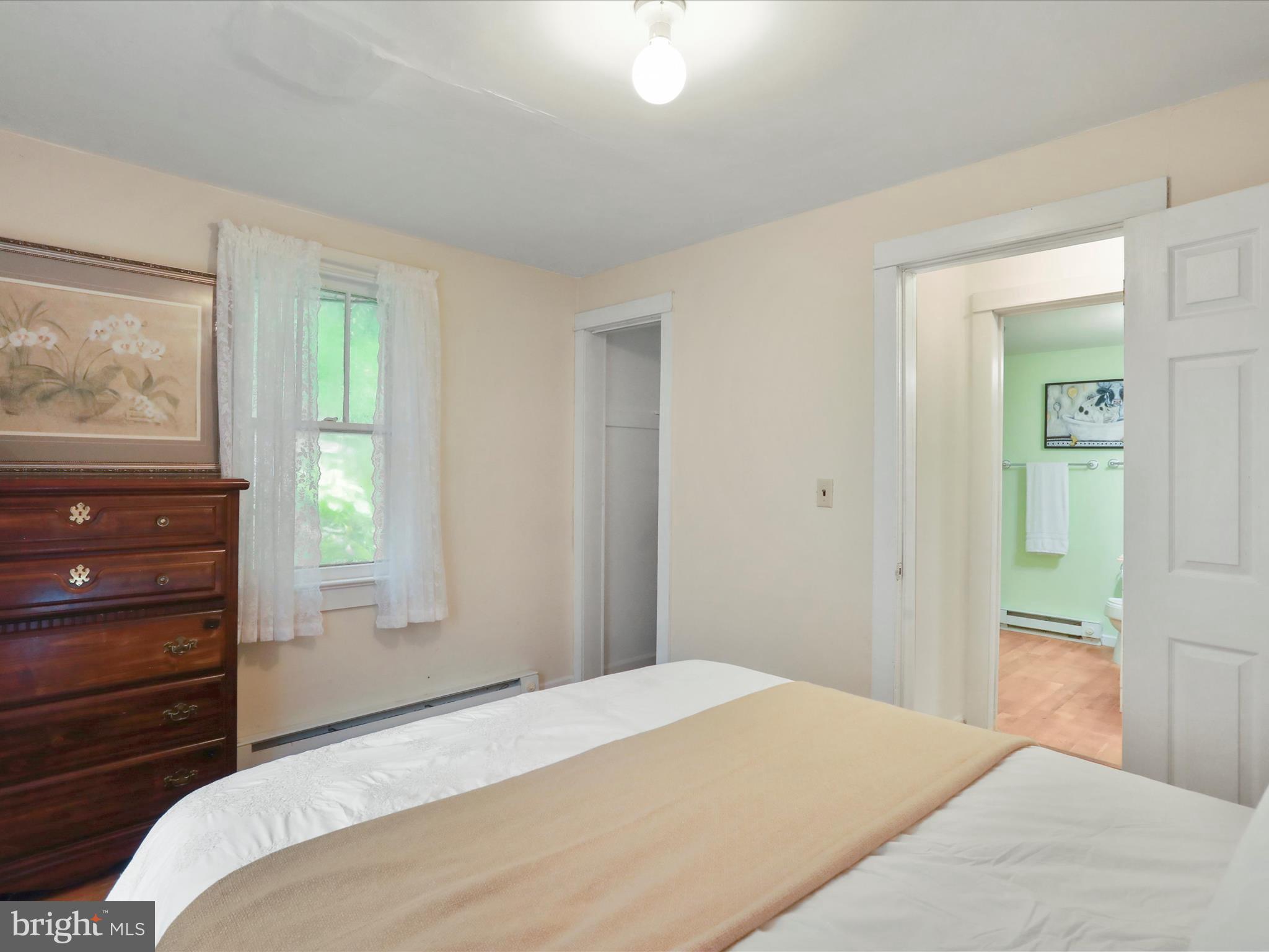 1485 Compton Hollow Road Rileyville, VA 22650 - Photo 24 of 55 a bedroom with a bed and a dresser