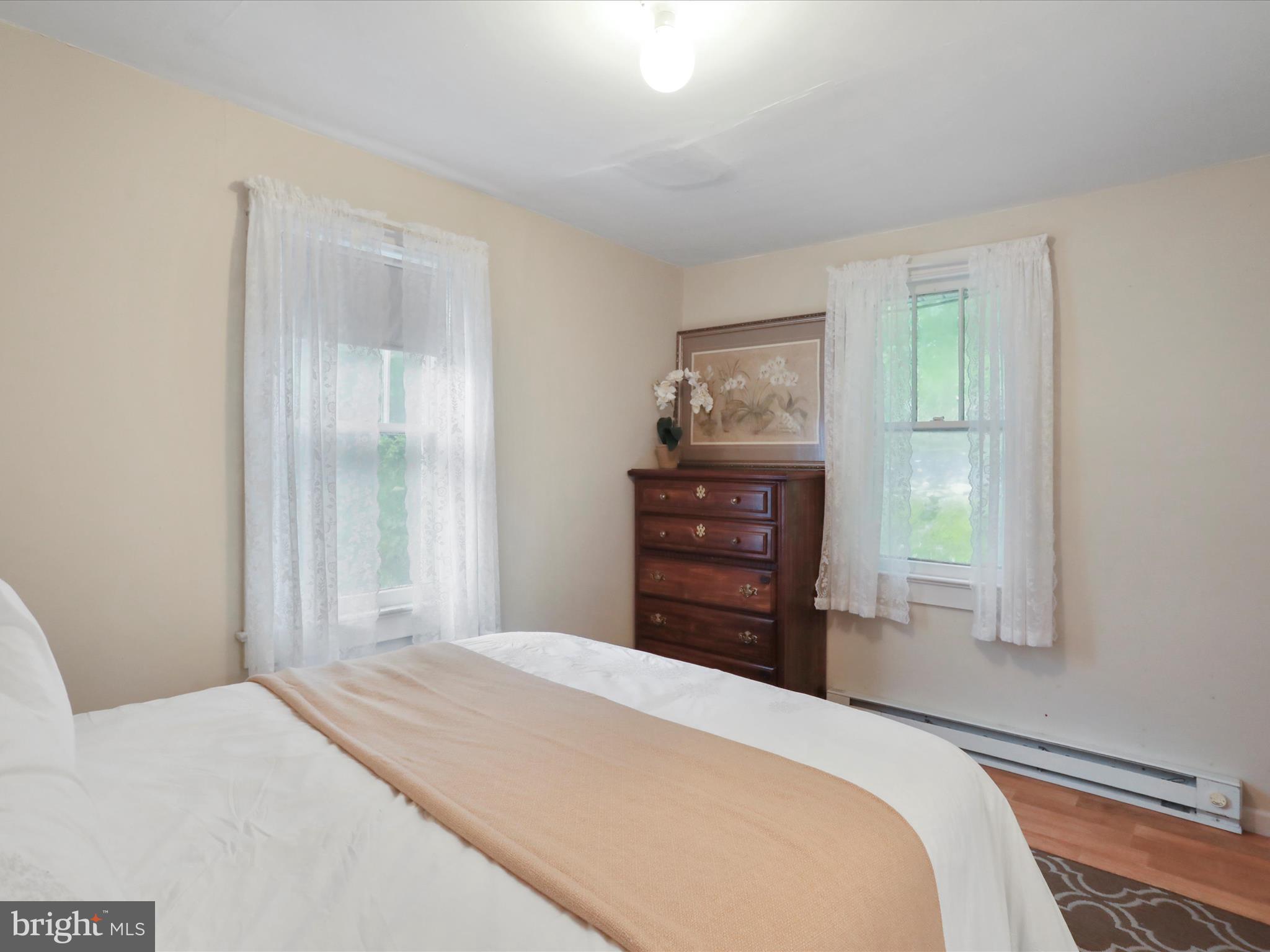 1485 Compton Hollow Road Rileyville, VA 22650 - Photo 25 of 55 a bedroom with a bed and window