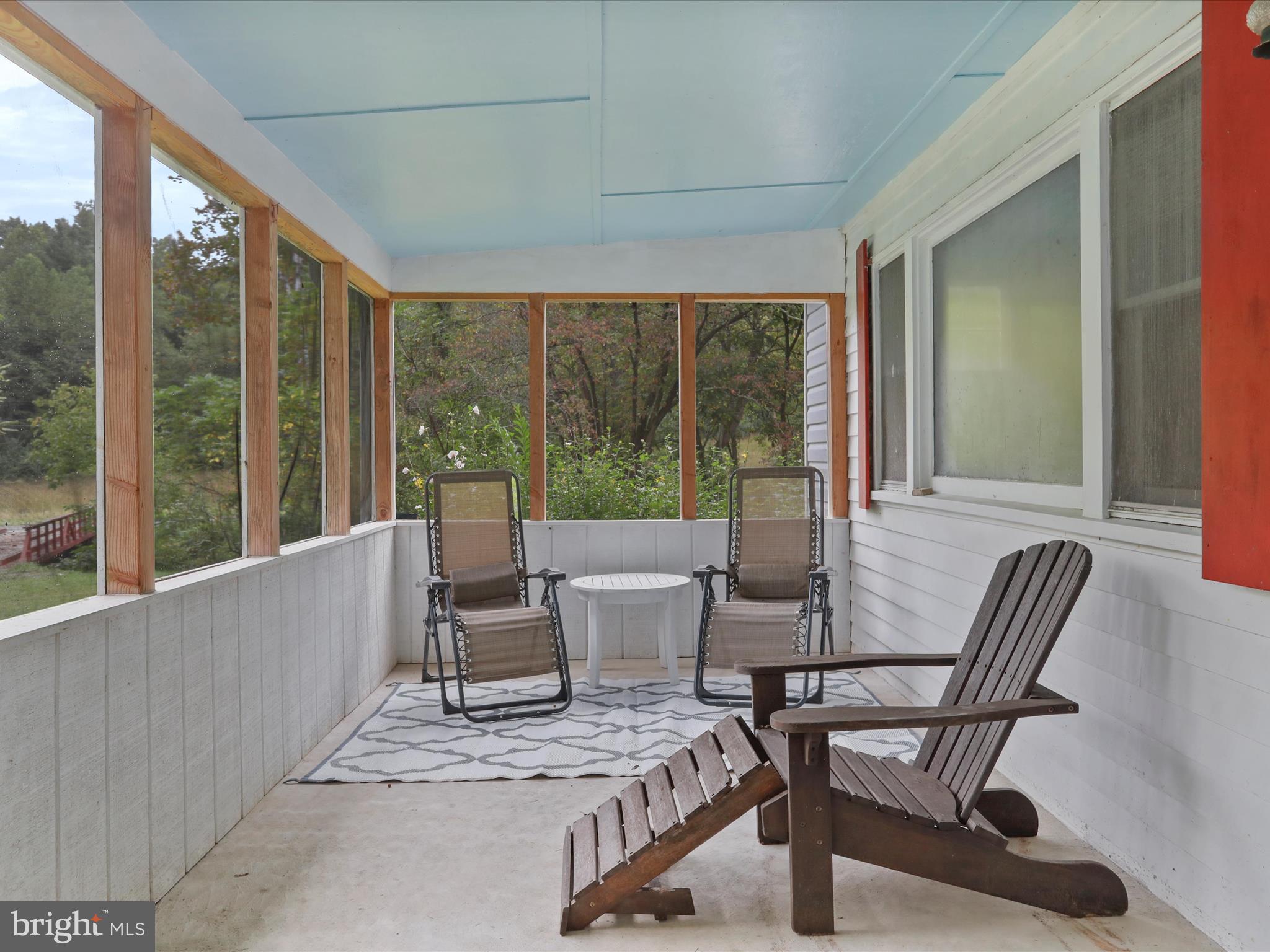 1485 Compton Hollow Road Rileyville, VA 22650 - Photo 34 of 55 a view of a dining room with furniture window and outside view