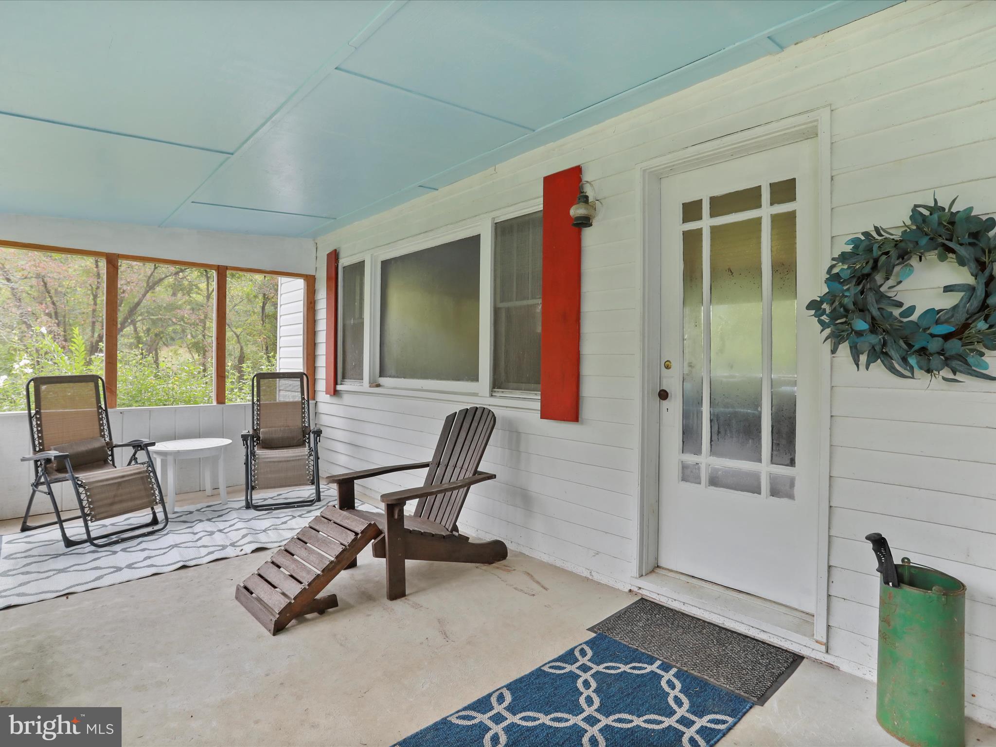 1485 Compton Hollow Road Rileyville, VA 22650 - Photo 35 of 55 a view of a workspace with furniture and a window