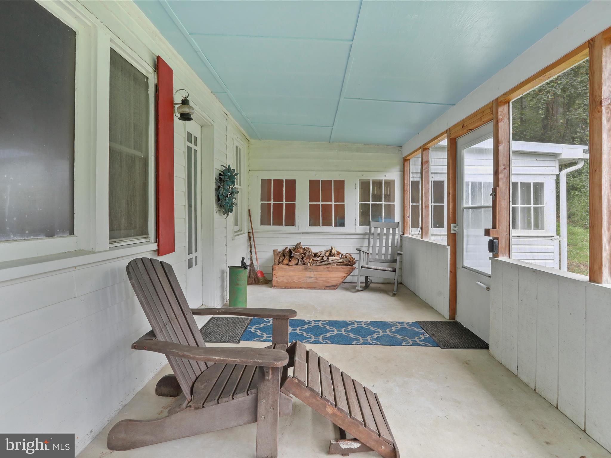 1485 Compton Hollow Road Rileyville, VA 22650 - Photo 36 of 55 a outdoor living space with furniture and a potted plant