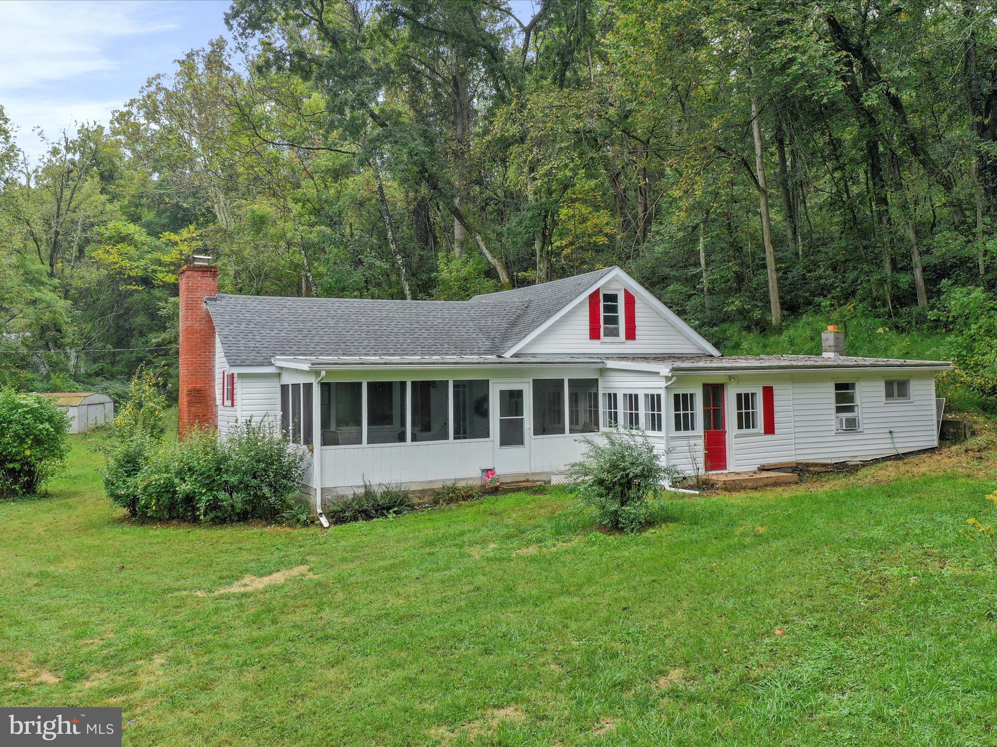 1485 Compton Hollow Road Rileyville, VA 22650 - Photo 4 of 55 a view of a house with backyard and garden