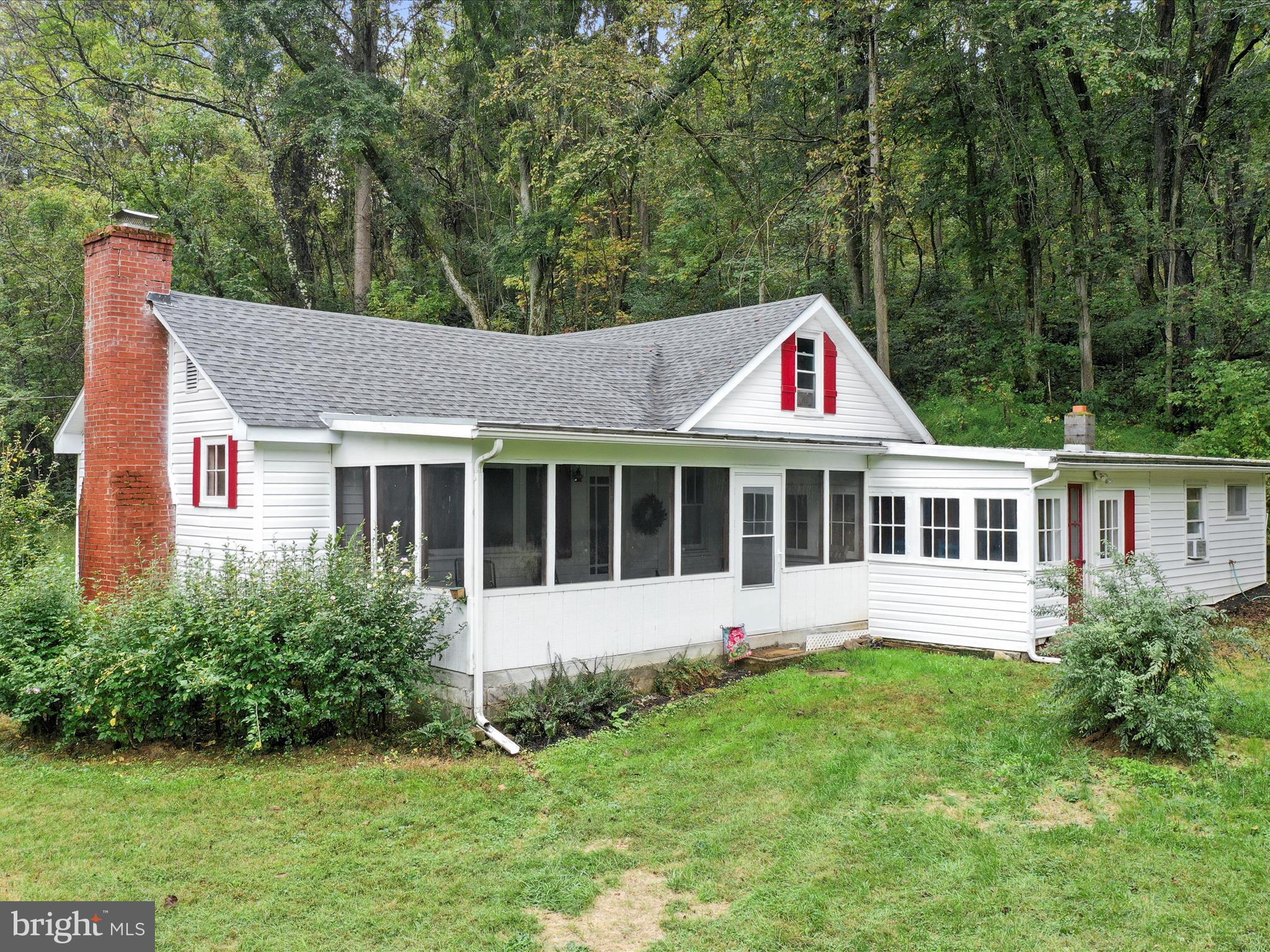 1485 Compton Hollow Road Rileyville, VA 22650 - Photo 46 of 55 a aerial view of a house with a yard and sitting area