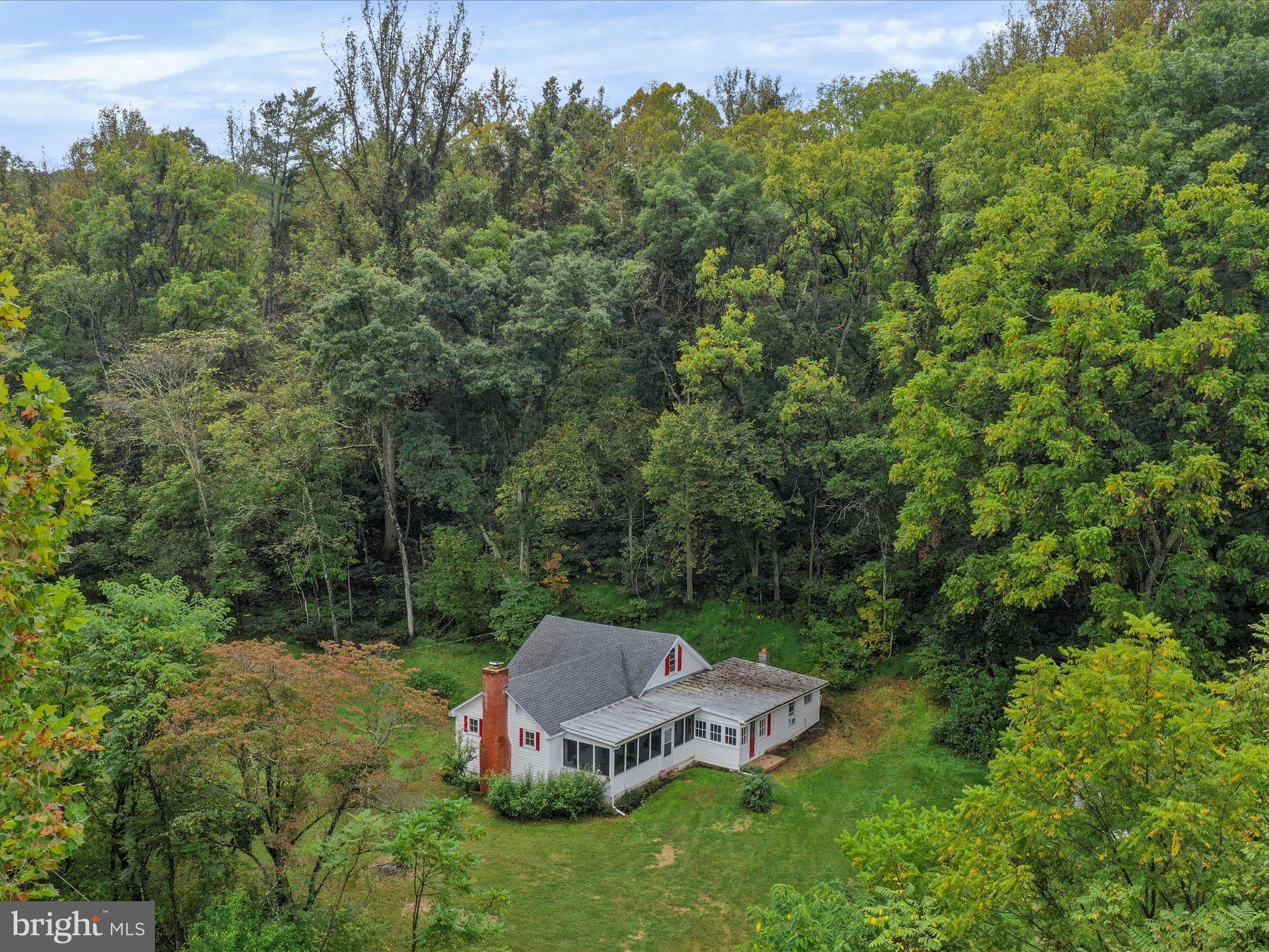 1485 Compton Hollow Road Rileyville, VA 22650 - Photo 54 of 55 a view of a house with a yard and sitting area