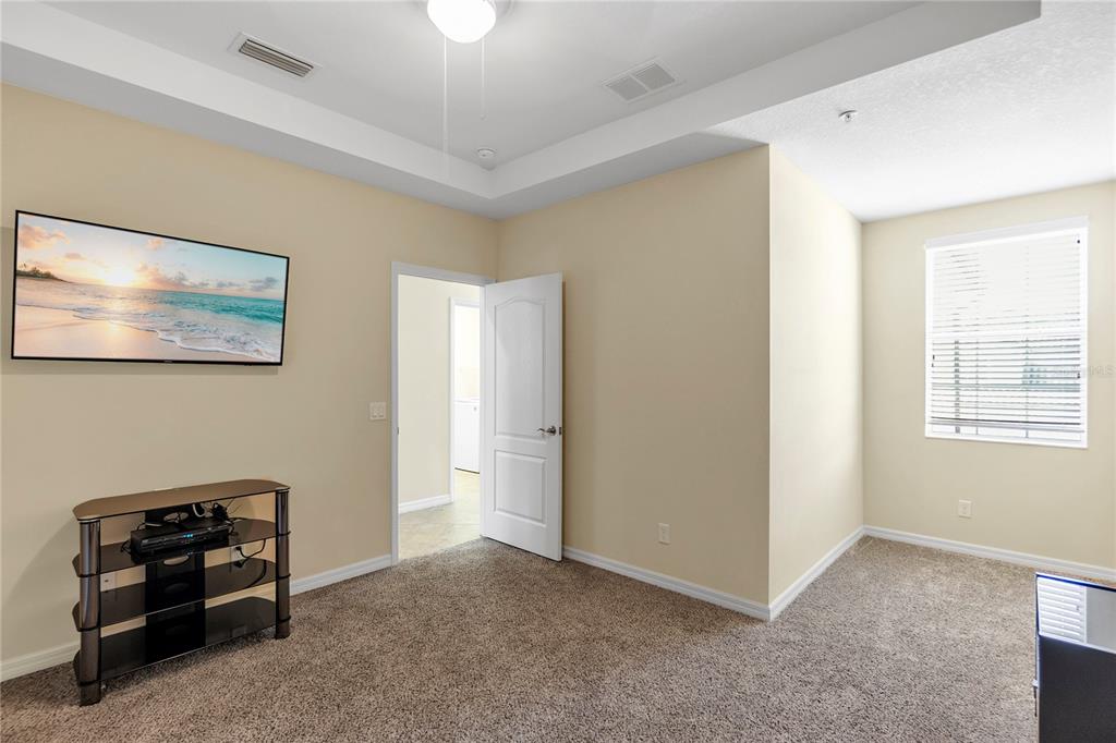 8141 Miramar Way, Unit 8141 Lakewood Ranch, FL 34202 - Photo 21 of 26 a big room with windows and closet