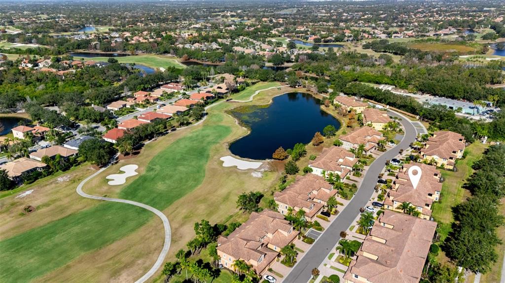 8141 Miramar Way, Unit 8141 Lakewood Ranch, FL 34202 - Photo 23 of 26 an aerial view of a city