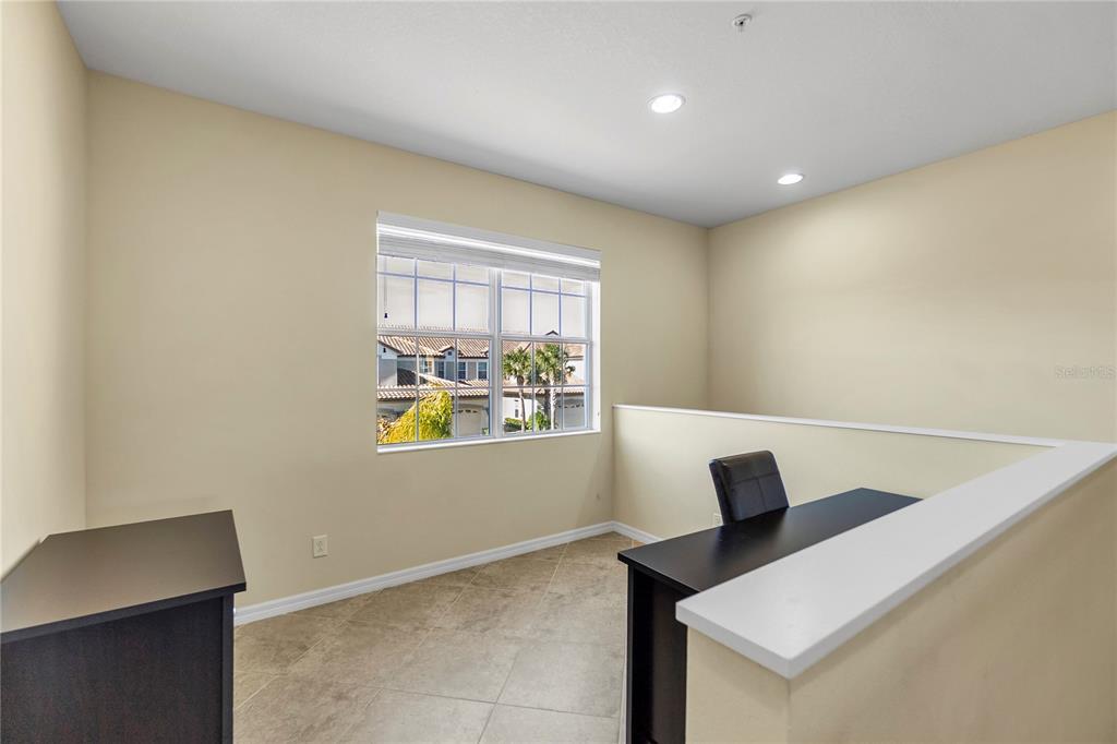 8141 Miramar Way, Unit 8141 Lakewood Ranch, FL 34202 - Photo 6 of 26 a view of entryway with wooden floor